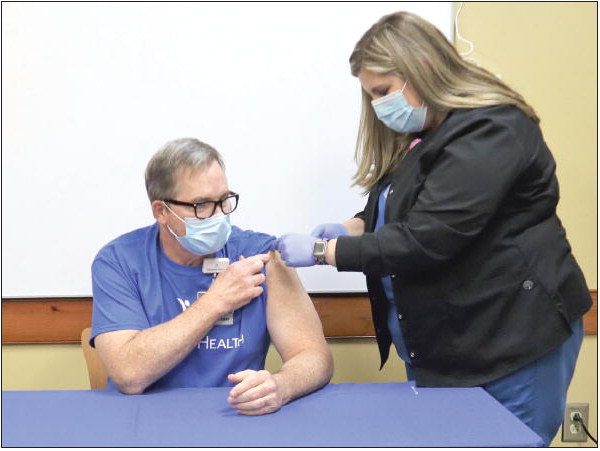 First Doses of Covid-19  Vaccine Administered