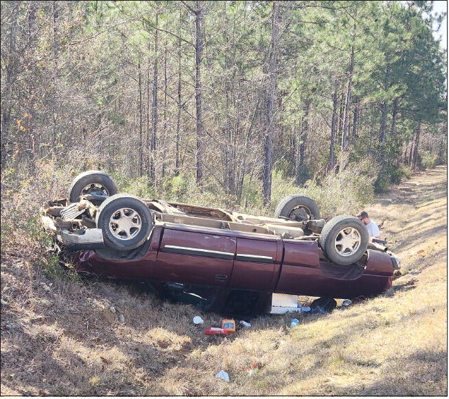 Man Walks Away Unharmed  From Flipped Truck