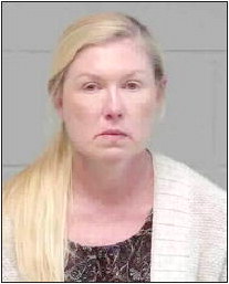 Woman Charged in  Glenwood Case; 12- Hour  Delay in Notifying the Law