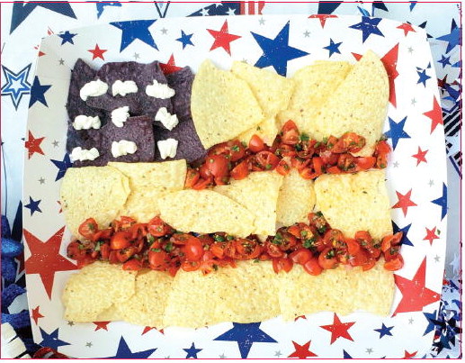 Celebrating the Land of the  Free this Independence  Day with the Nacho &  Cherry Tomato Flag Dip!