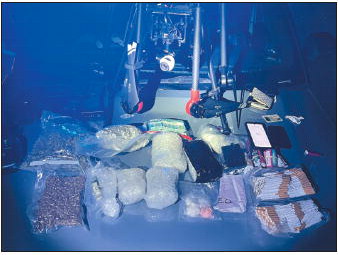 Law Officers Intercept Contraband   Apparently Bound for Area Prison