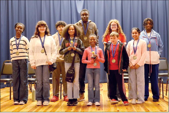 Singletary Named MoCo Spelling Bee System Champion Singletary Named MoCo Spelling Bee System Champion