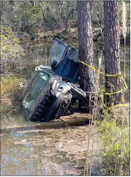 Higgston Fire Chief Rescues  Woman From Wreck