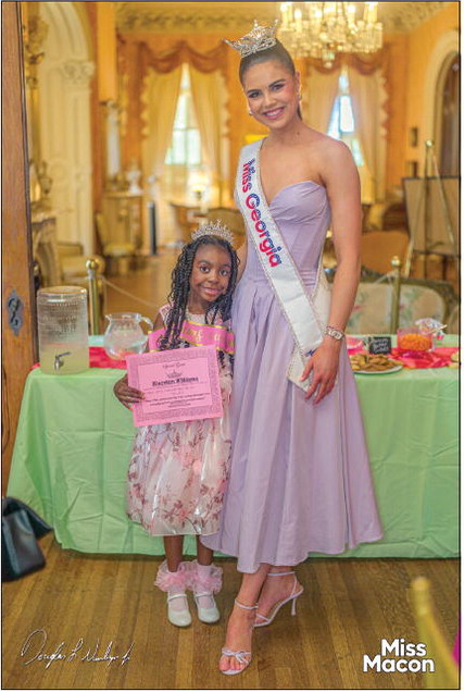 Miss 
	 Macon 
	CROWNED BY ….